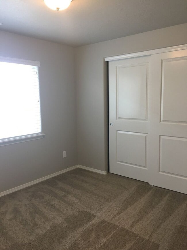 Building Photo - Cozy 2BR Home with Covered Patio & Animal-Friendly Yard – Utilities Included!