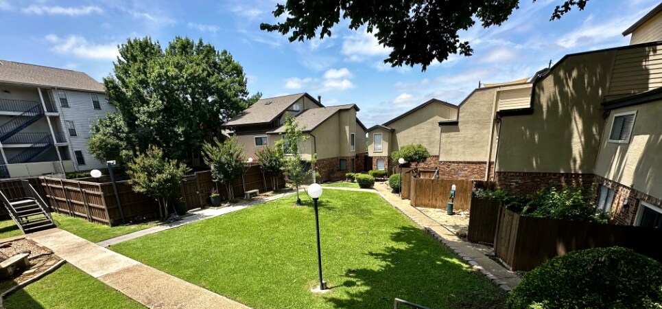 View of community courtyard from the top of the stairs - 6723 Eastridge Dr