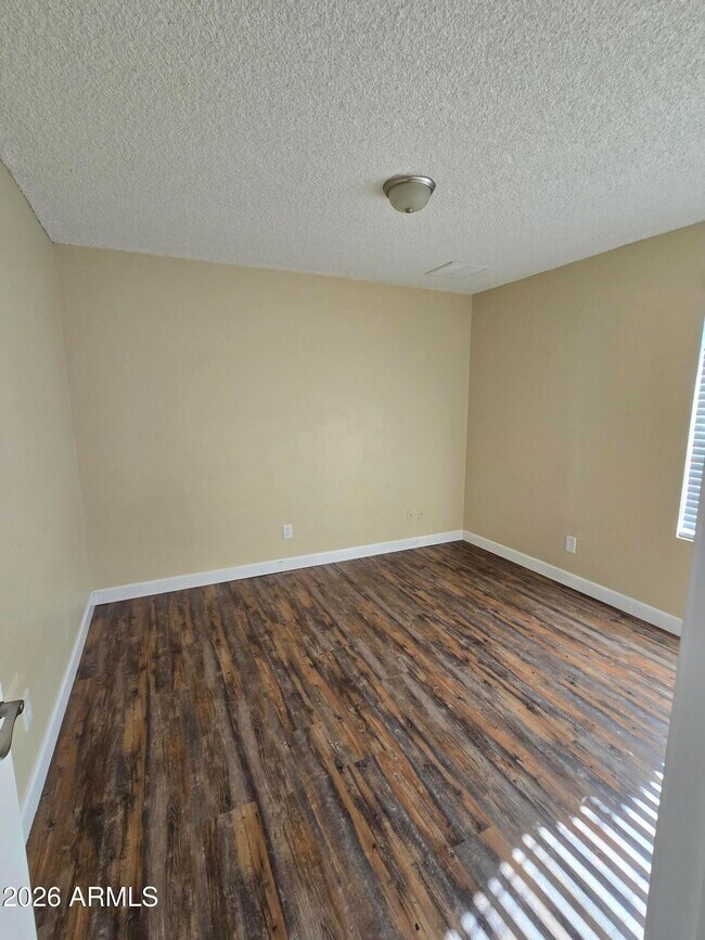 Building Photo - 9002 W Roma Ave