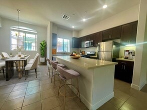 Building Photo - 3 Bed/3 Bath, 2 Garage & 2 Balconies Gated...