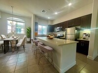 Building Photo - 3 Bed, 3 Bath Gated Modern Townhome –  2-Car Garage, 2 Balconies, All Appliances & AC