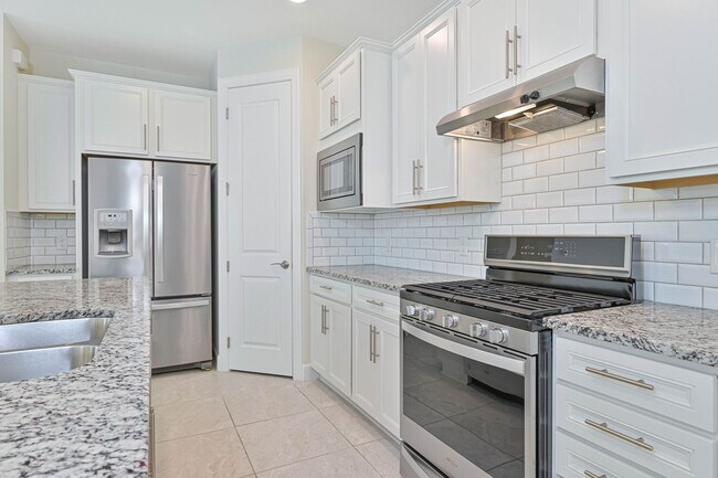 Building Photo - NOW AVAILABLE - 2/2 Plus Den Single Family Home in the Heart of Estero!