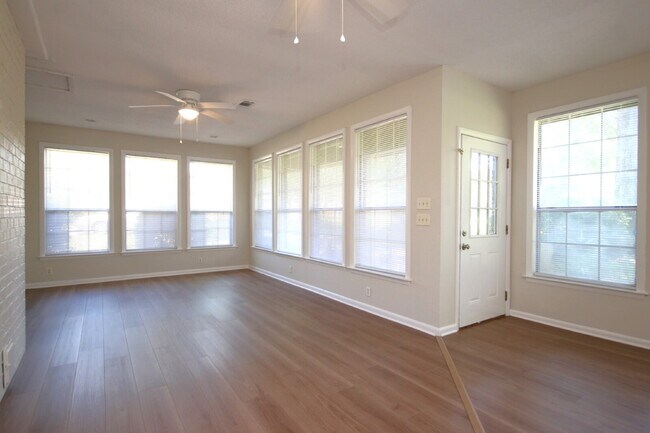 Building Photo - Fully Renovated 3BR/2BA Molino Home on a Spacious Lot Featuring Multiple Living Areas, Sunroom & ...