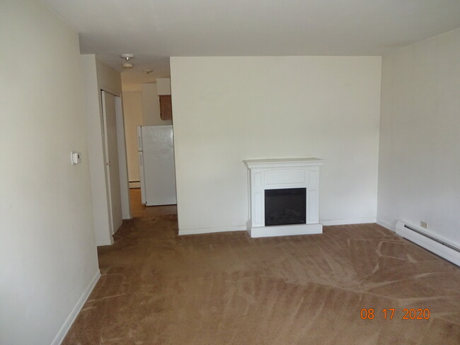 Front Room w/Electric Fireplace - 240 W Quincy St