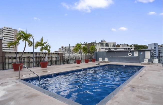 Building Photo - The Townhouse 1 Bed, 1 Bath, 1 Covered Parking with A/C