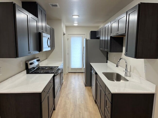 Building Photo - Introducing a newly constructed 3-bedroom, 2-bathroom house in the desirable location of Russellv...
