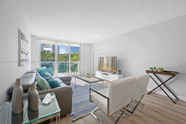 Building Photo - 19370 Collins Ave