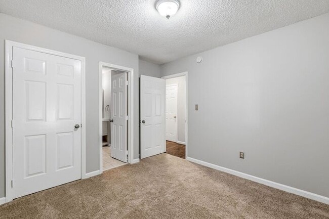 Building Photo - NW - Updated Home with Granite Counter-tops, Fire Place, Deck, Storage Building, Garage!