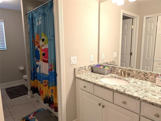 Building Photo - 7545 Pool Compass Loop