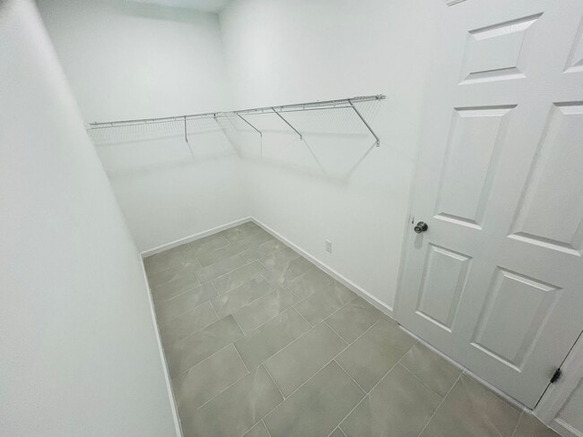 Building Photo - BRAND NEW CONSTRUCTION- ONE OF A KIND-ONE BEDROOM, ONE BATH-ONE CAR GARAGE- LEHIGH ACRES