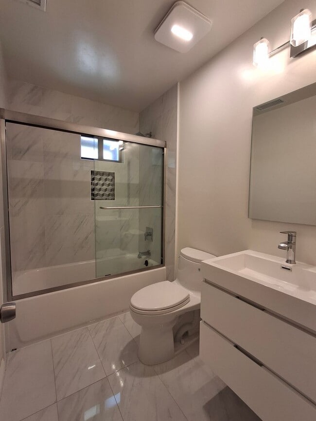 Building Photo - Beautifully Renovated Home with 2-Car Gara...