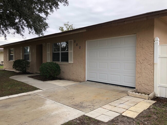 Building Photo - Large Fenced Yard | Central Air | Garage |...