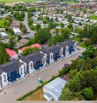 Building Photo - 3-Story Urban Walk Up at a modern communit...