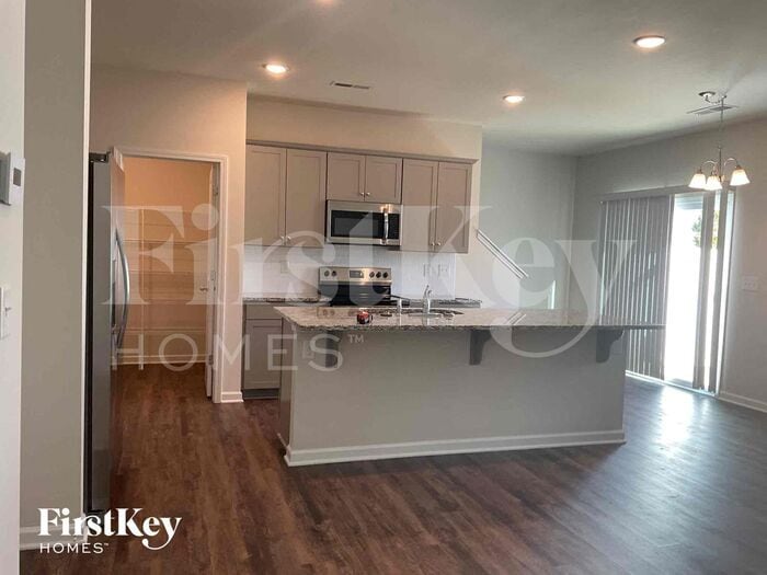 Building Photo - 10717 Rivergate Dr NW