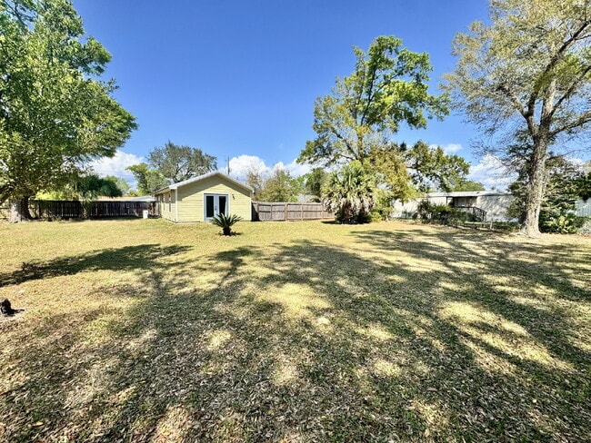 Building Photo - Cute newer home with large fenced yard!