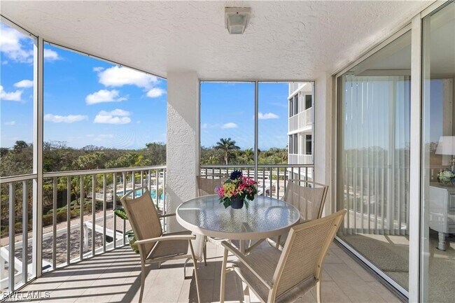 Building Photo - 6361 Pelican Bay Blvd