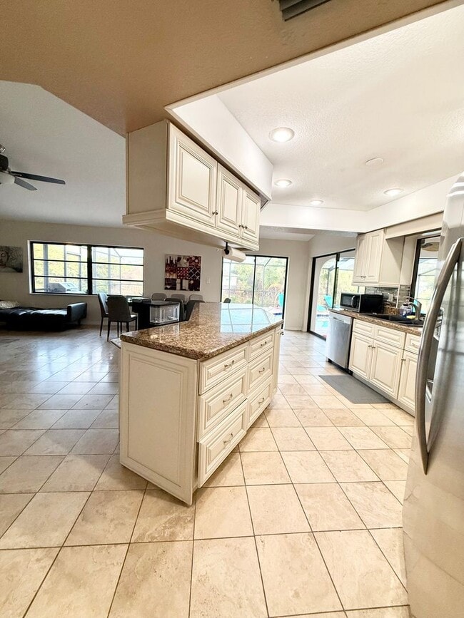 Building Photo - Stunning Furnished Pool him on Accessible Canal