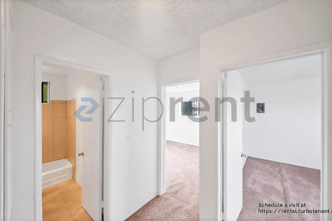 Building Photo - 2458 Normandie Ave