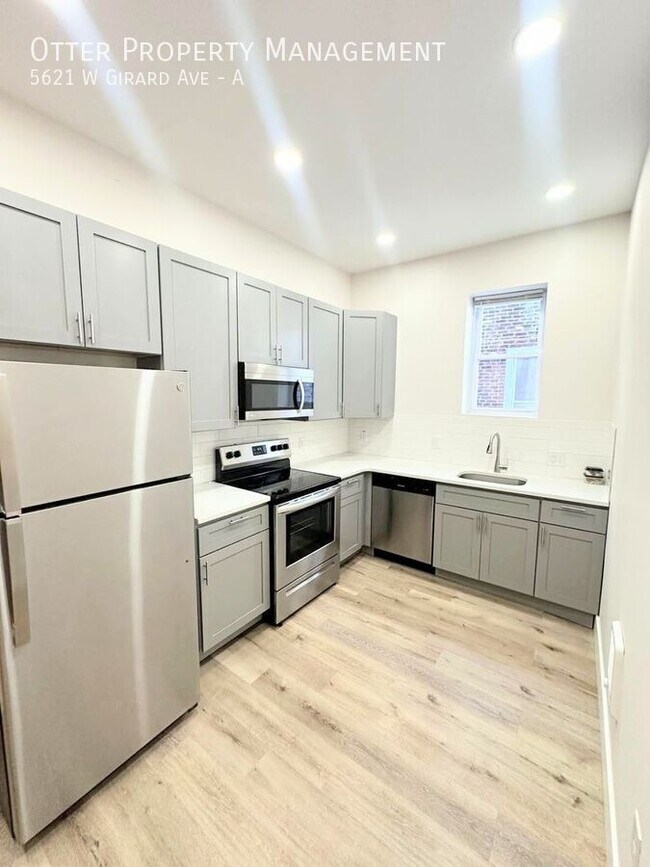 Building Photo - 5621 W Girard Ave