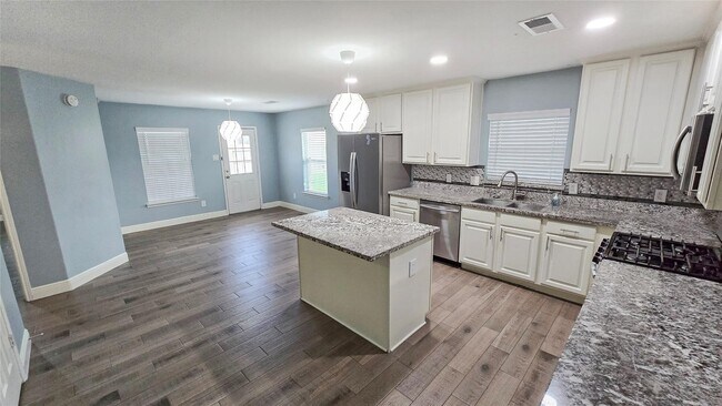 Building Photo - 6310 Macquarie Dr