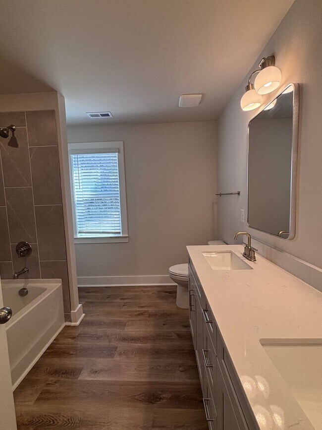 Building Photo - Brand new three-bedroom, 2.5-bath townhome