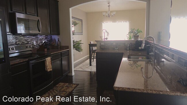 Building Photo - 4 br, 3 bath House - 7874 Pinfeather Dr
