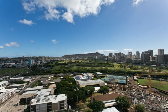 Building Photo - Royal Iolani Corner Unit - 2 PRK w/ ALL Ut...