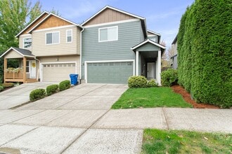 Building Photo - 4 bedrooms 2.5 bath, fenced backyard, AC, ...