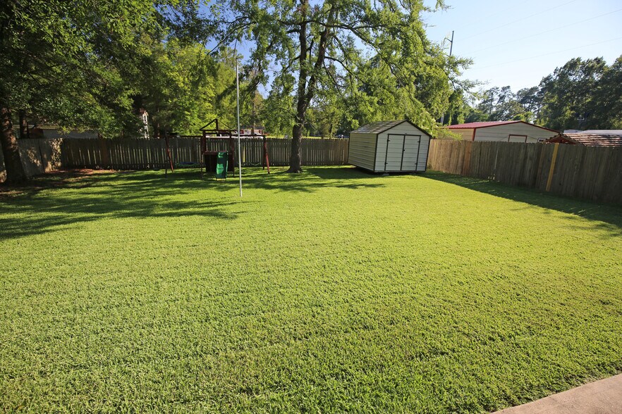 Swing set will be moved before move in; storage shed stays - 704 Tom Temple Dr