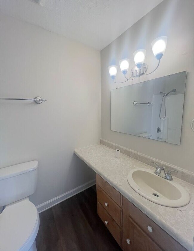 Building Photo - Brick one level home, Live Oak Tree, 3-4 bedrooms, fenced yard, deck.