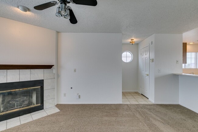 Building Photo - Charming Second-Floor Condo with Two Bedrooms and Fireplace