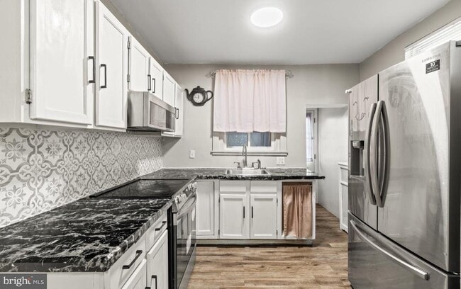 Building Photo - 6813 Ditman St