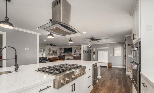 Building Photo - A Private Oasis with Unmatched Amenities 4 Bedroom 3 Bath