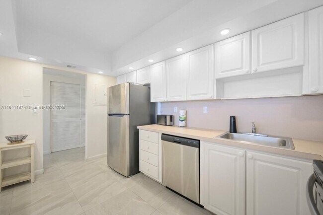 Building Photo - 19370 Collins Ave
