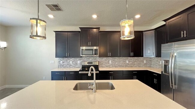 Building Photo - 15079 Evergreen Oak Loop