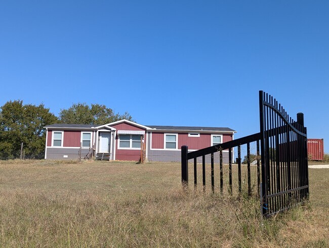 Looking at the house from the road - 179 Davis Rd
