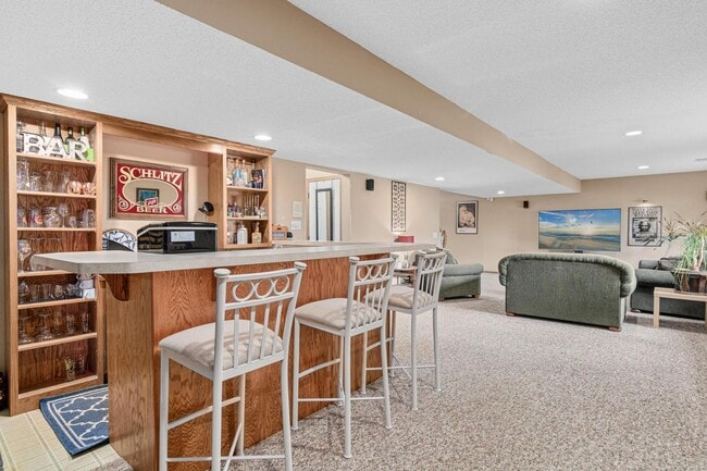 Building Photo - Luxury 4-Bed Retreat with In-Ground Pool & 3-Car Garage