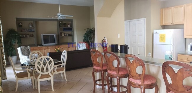 Building Photo - 4 BR / 3 FULL BATH (INCLUDES 2 MASTERS) 2 STORY (NEAR DISNEY!) GATED COMMUNITY WITH COMMUNITY POO...