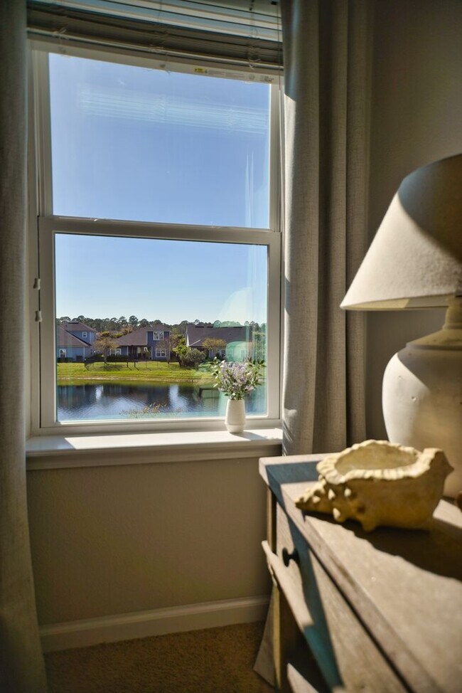 Building Photo - Beautiful Pond-Front Home Near Amelia Concourse