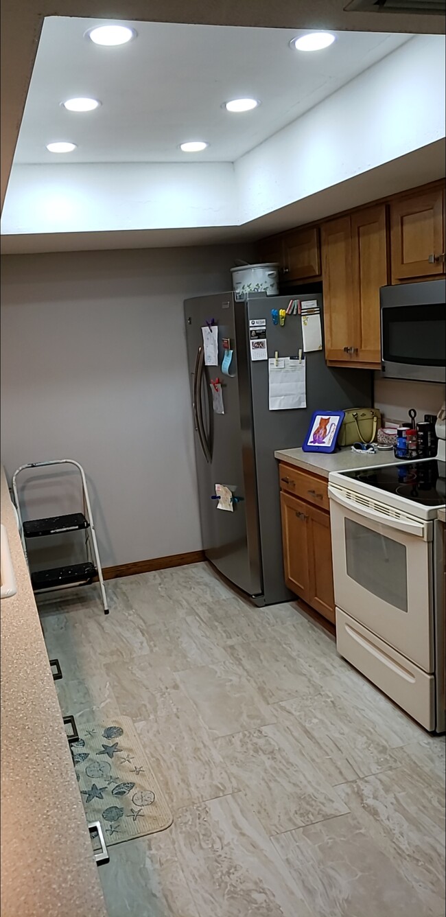 New tile floor kitchen - 47 Sea Island Dr N