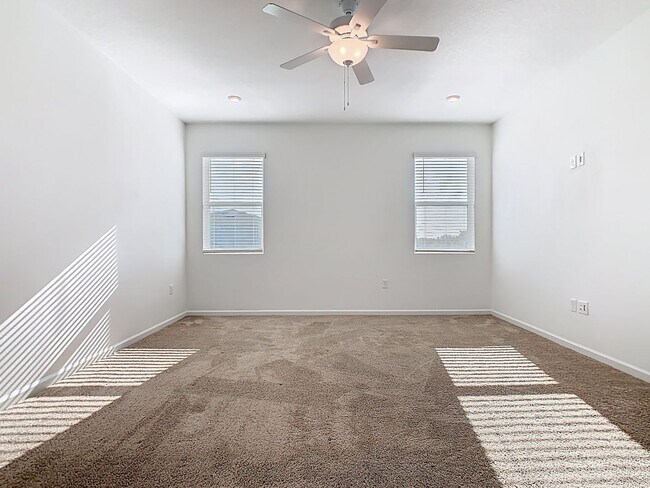 Building Photo - JUST REDUCED! PET FRIENDLY! Experience Com...