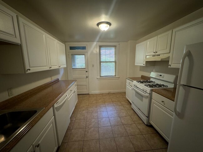 Building Photo - Updated Highland Park Townhome!