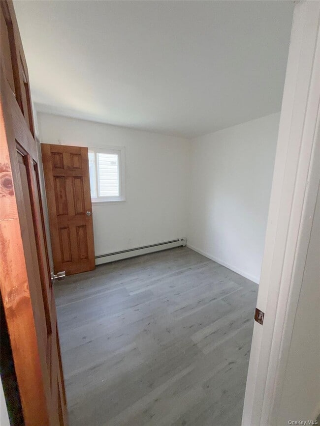 Building Photo - 69-47 Hillmeyer Ave