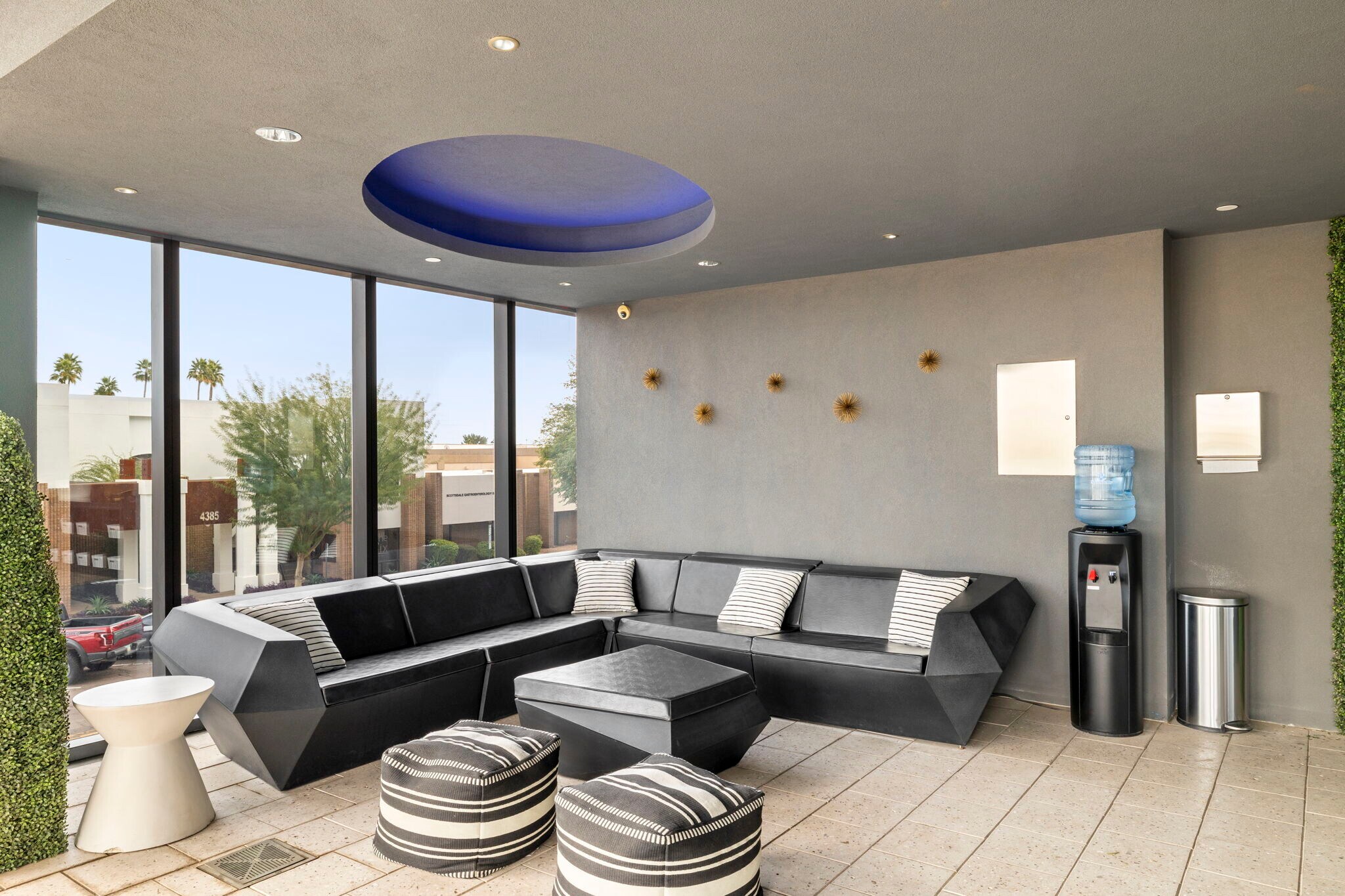 Multiple covered seating areas for relaxing by the pool - 4422 N 75th St
