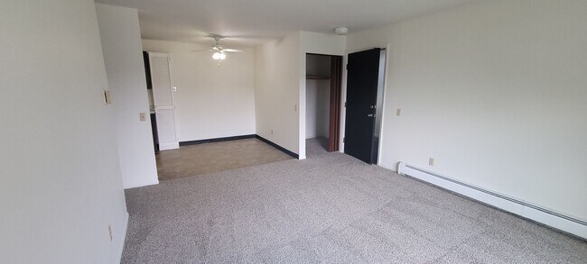 Building Photo - Upper 2 Bedroom Apartment – Heat Included - Available: First Week of July  2026