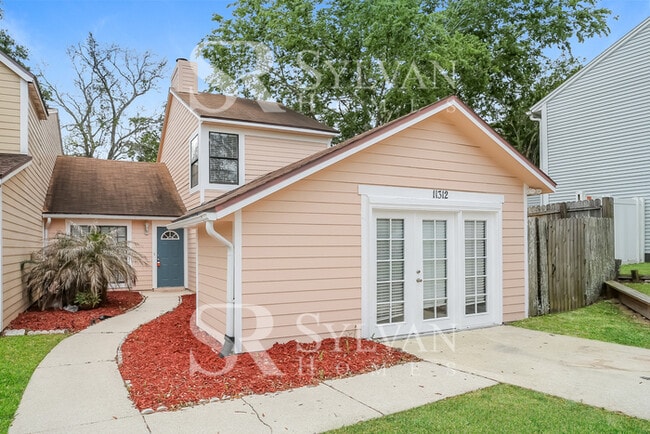 Primary Photo - Feel right at home in this charming 3 bedroom, 2 bathroom home
