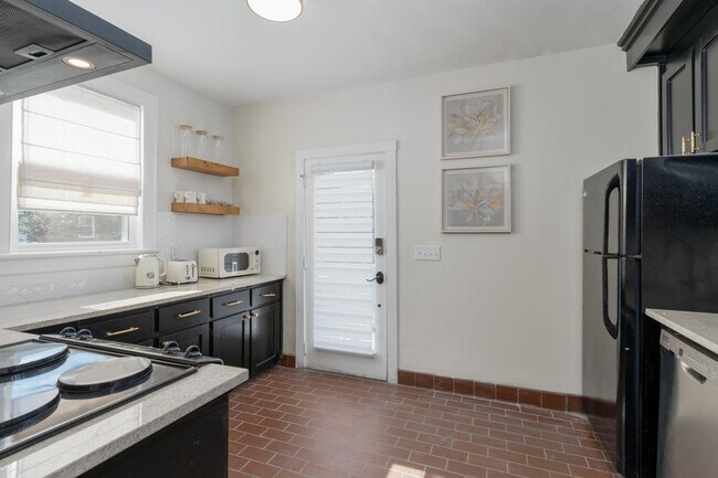 Building Photo - Leasing Now! - Charming 3-Bed, 2-Bath Stone Cottage in Shandon/Wales Garden - Walk to 5 Points!