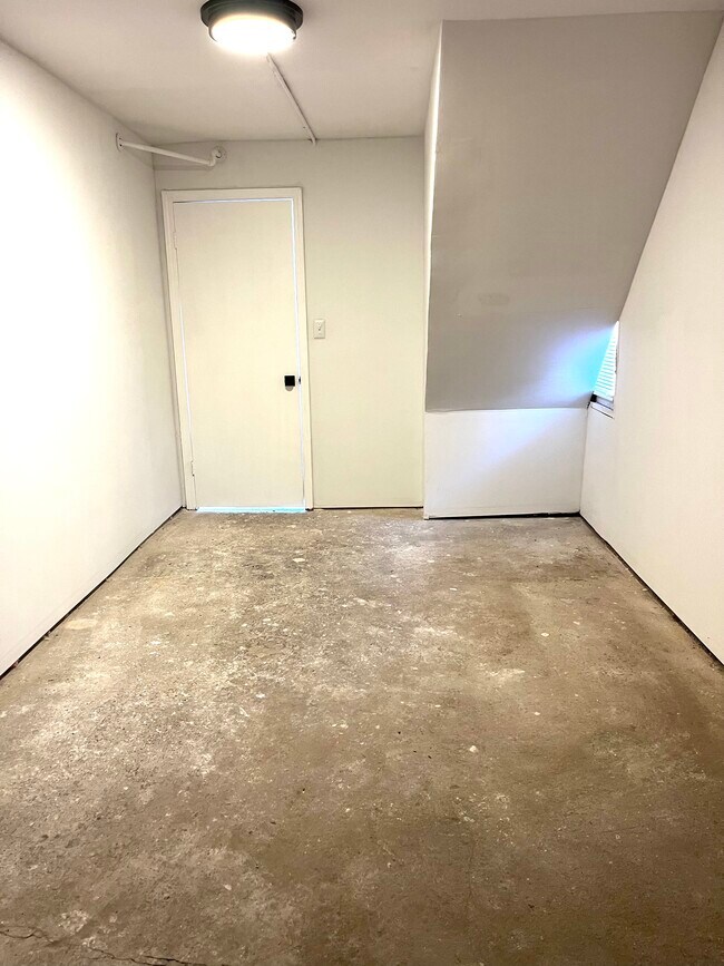 Semi-finished garage space - 10174 W Ford Ave