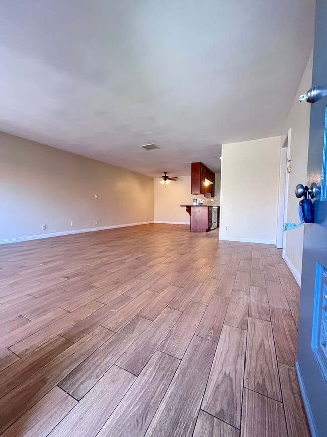 Building Photo - SINGLE STORY 3 BR/ 2 HOME WITH 2 CAR GARAGE