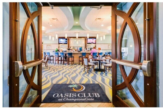 Building Photo - BEAUTIFUL CHAMPIONS GATE 2 BED 2 BATH COND0  w/GARAGE - FULLY FURNISHED - 12 MONTH RENTAL